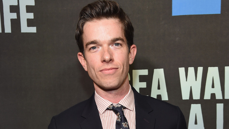 John Mulaney smiling 