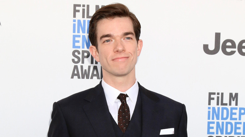 John Mulaney smiling 