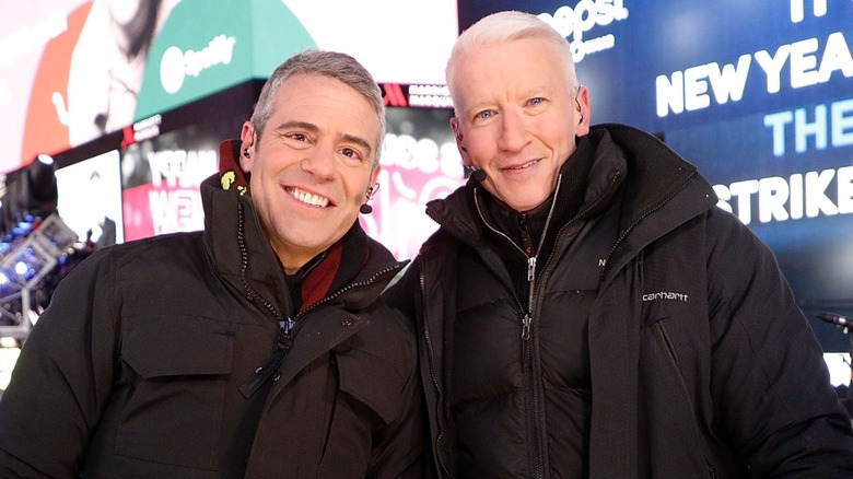 Andy Cohen and Anderson Cooper posing together
