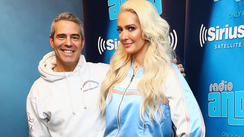 Andy Cohen stands with Erika Jayne