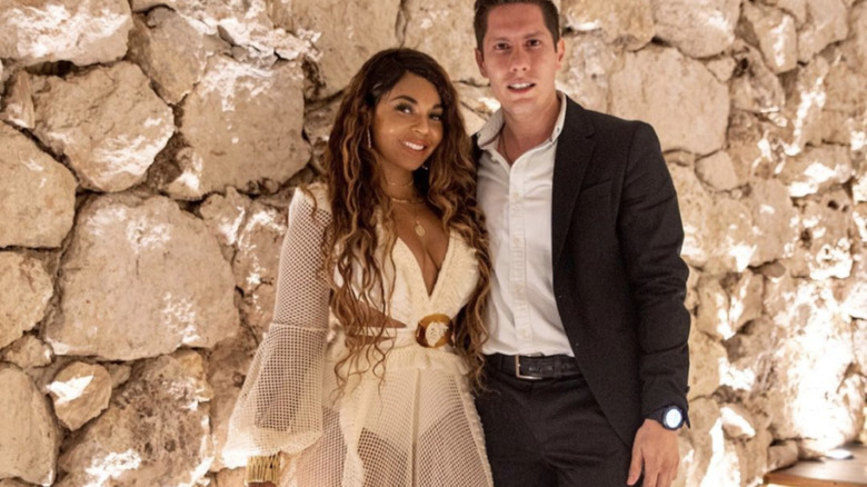 Ashanti with a man in Cancun