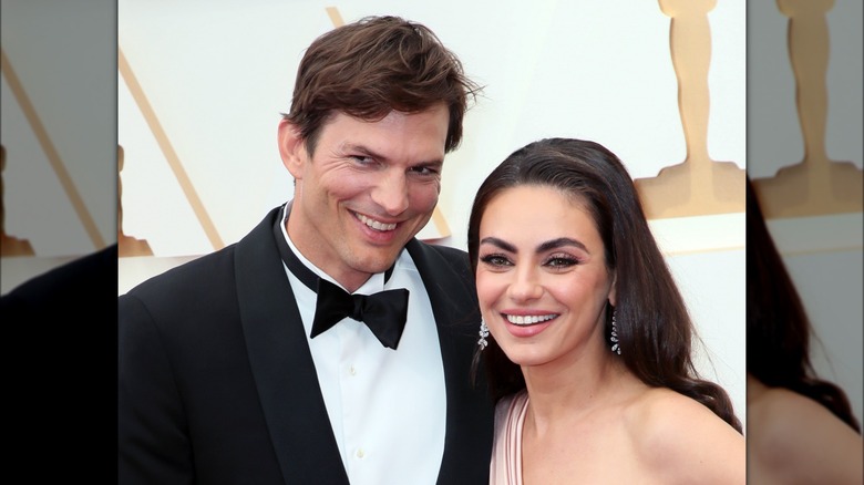 Ashton Kutcher and Mila Kunis smiling