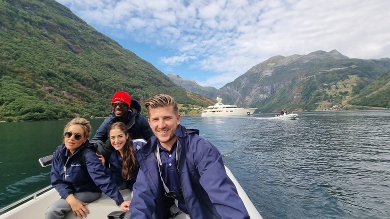 crew members on a small boat