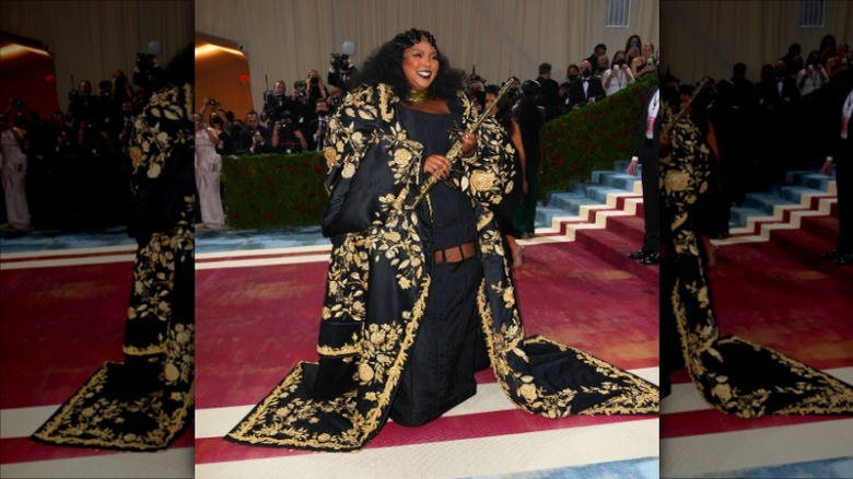 Lizzo posing with flute at the 2022 Met Gala