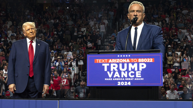 RFK Jr. delivering a speech with Donald Trump looking on