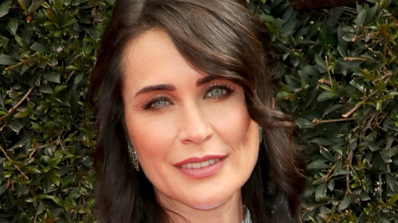 Rena Sofer smiling