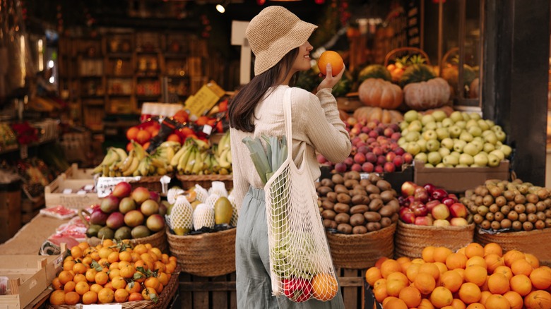 Woman buying fresh produce