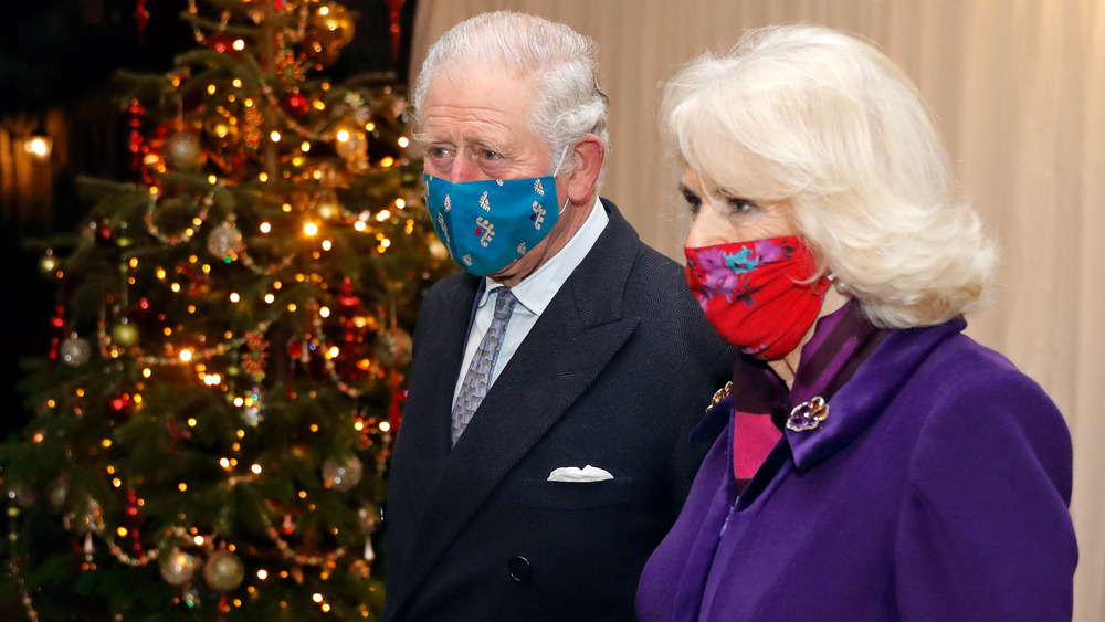 Camilla Parker Bowles and Prince Charles with face masks on