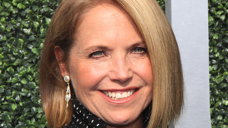 Katie Couric smiles on the red carpet