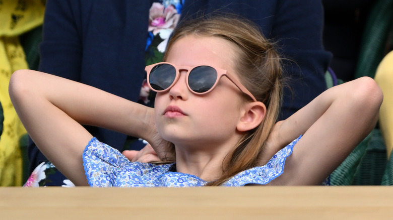 Princess Charlotte looking cool and confident in sunglasses