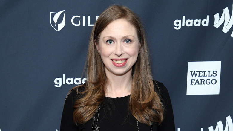 Chelsea Clinton posing at an event