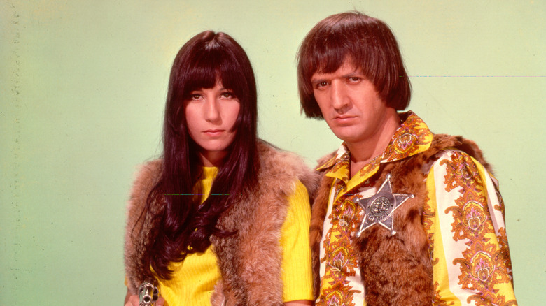 Sonny and Cher looking stern