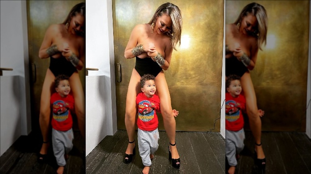 Chrissy Teigen poses with her son Miles