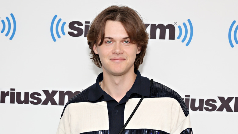 Christopher Briney smiling at an event