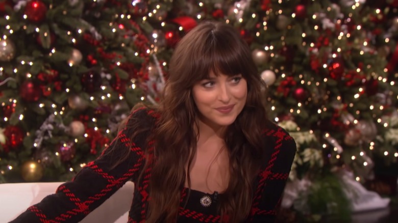 Dakota Johnson smirking on 'The Ellen DeGeneres Show'