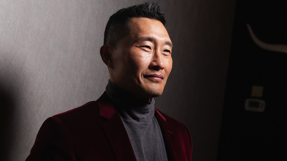 Actor Daniel Dae Kim in red blazer and turtleneck