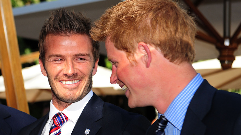 Prince Harry and David Beckham laughing together