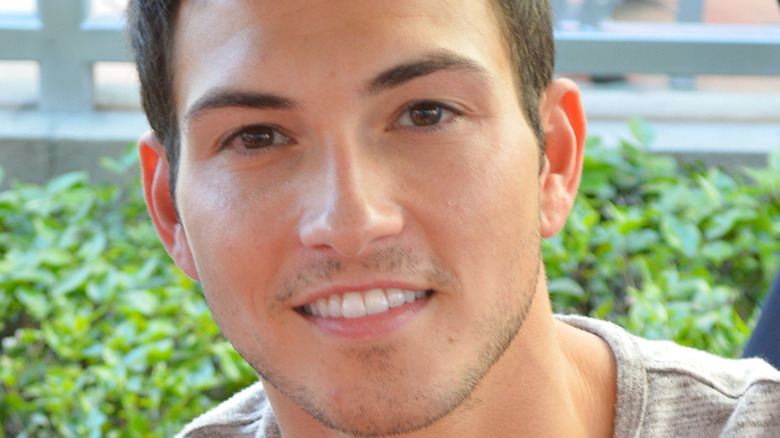 Robert Scott Wilson smiles for the camera. 