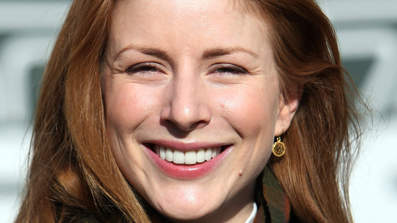 Diane Neal smiles at an event