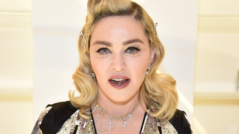 Madonna poses at an event