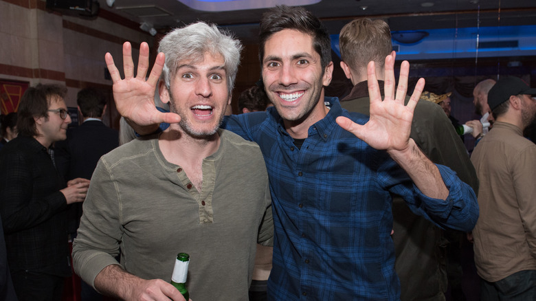 Max Joseph posing with Catfish co-host Nev Schulman