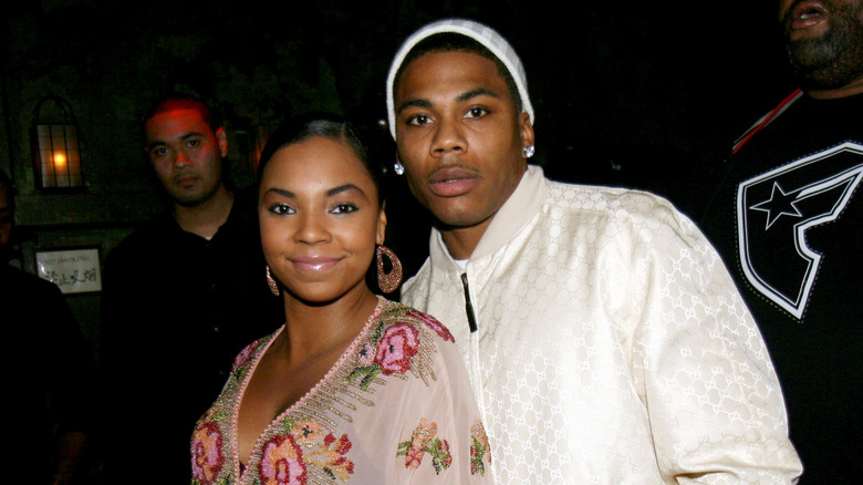 Nelly and Ashanti posing for pics