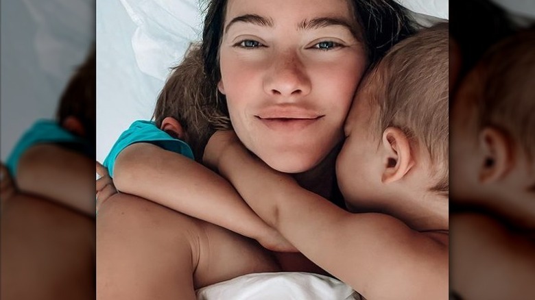 Jacqueline MacInnes Wood with her children