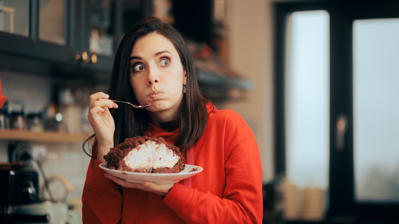 Woman eating cake