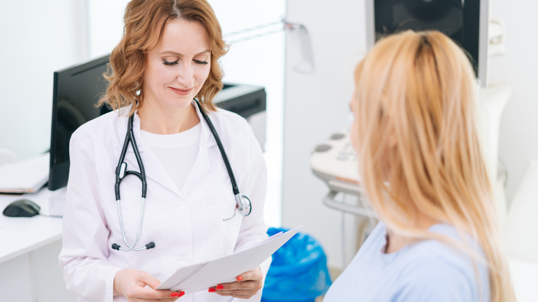 doctor talking with patient