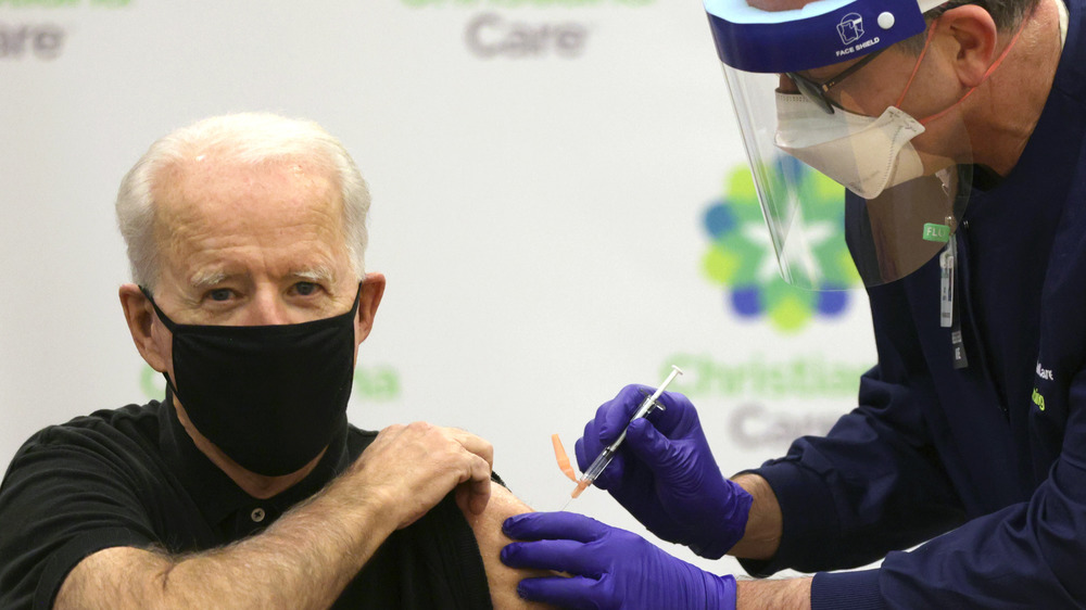 Biden gets publicly vaccinated against COVID