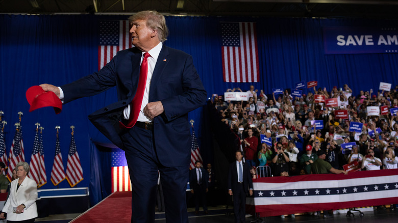 Donald Trump throw red hat