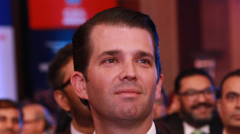 Donald Trump Jr. looking away from the camera