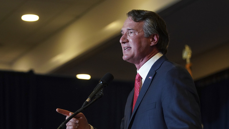 Youngkin in a blue suit at a campaign event