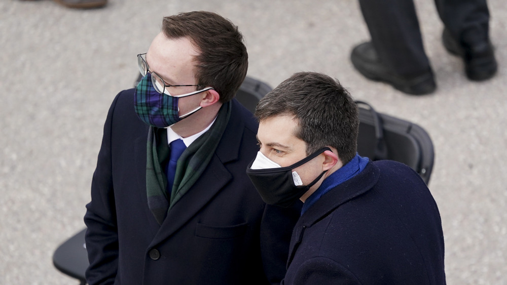 Chasten and Pete Buttigieg wearing two masks