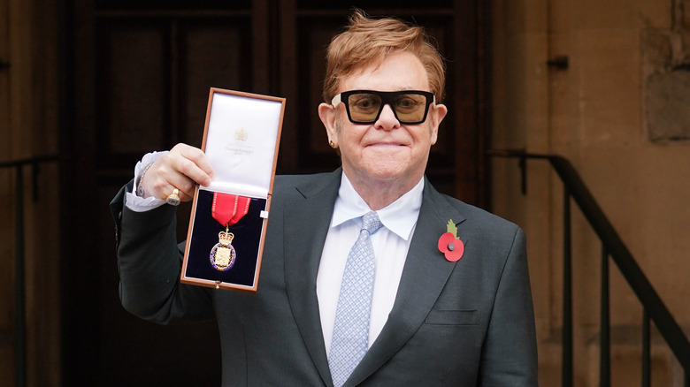 Elton John with award