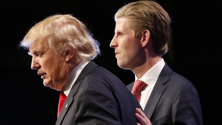 Eric Trump and Donald Trump at a campaign rally