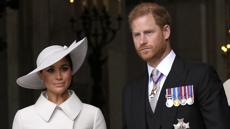 Meghan Markle and Prince Harry look demure at the Platinum Jubilee