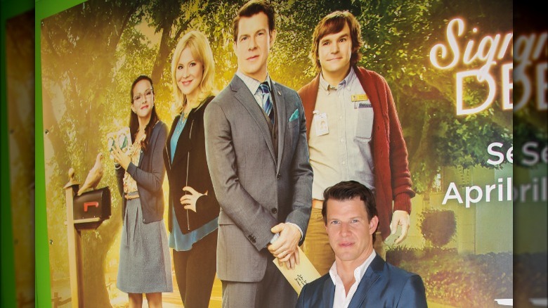 Eric Mabius with 'Signed, Sealed, Delivered' poster