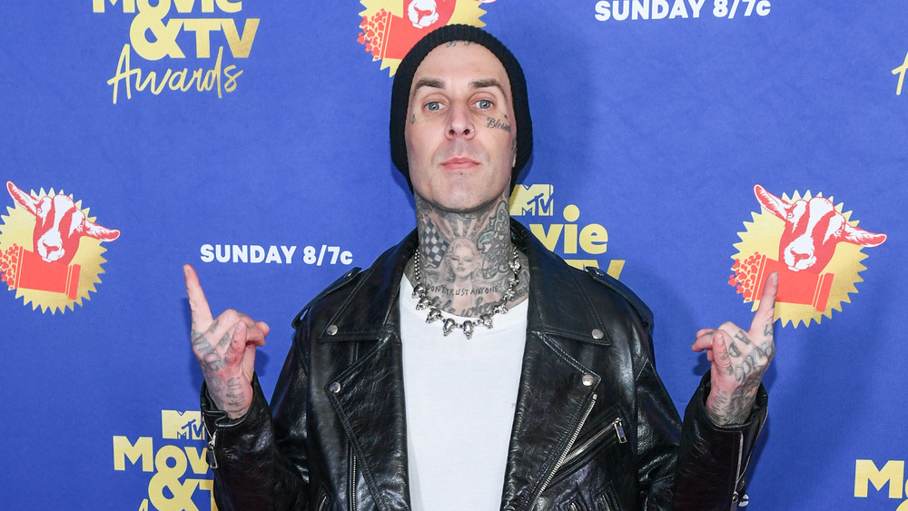 Travis Barker in leather jacket