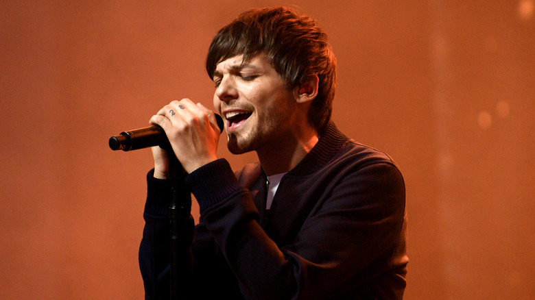 Louis Tomlinson performs onstage