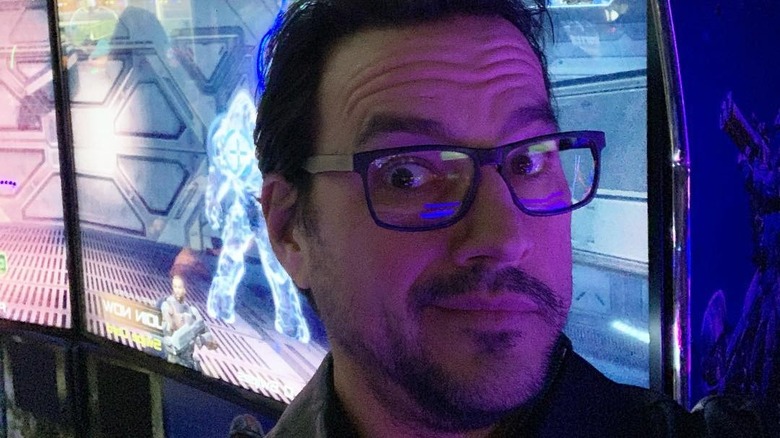 Tyler Christopher takes a selfie at an arcade