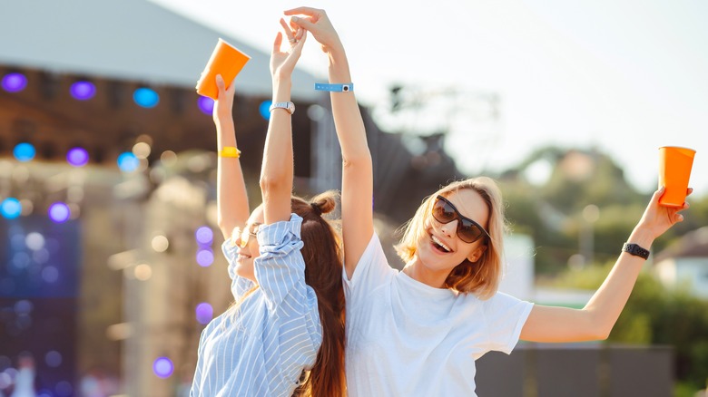 Women dancing at music festival