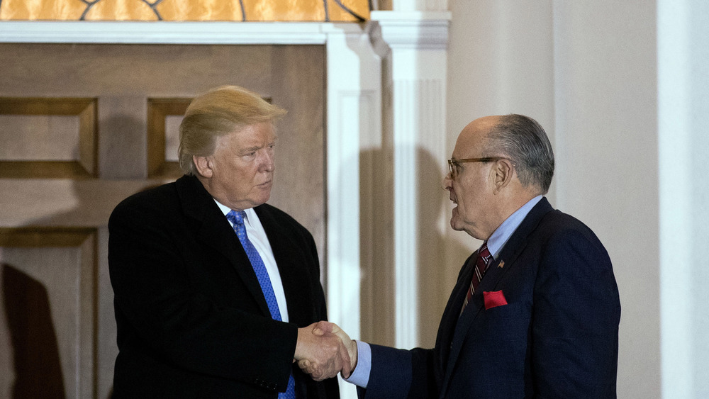 Trump and Giuliani shaking hands