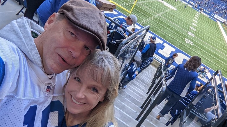 Karen E. Laine and husband Roger at a football game