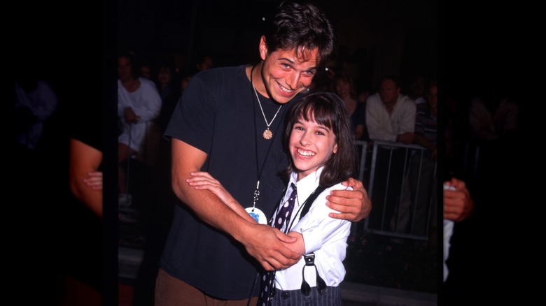 Scott Wolf and Lacey Chabert smiling