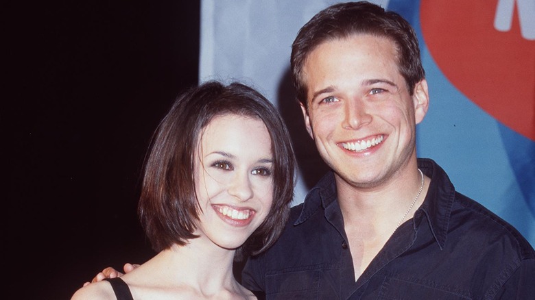 Lacey Chabert and Scott Wolf smiling