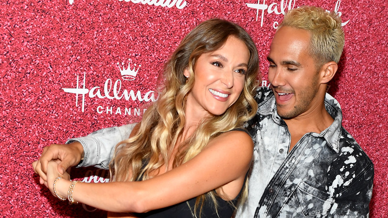 Carlos and Alexa PenaVega attending a Hallmark event