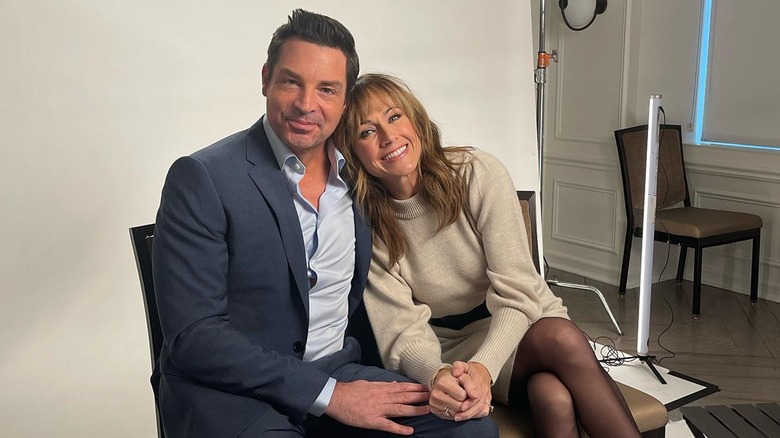 Brennan Elliott and Nikki DeLoach smiling