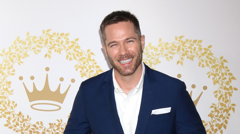 Luke Macfarlane poses at the Hallmark TCA event in 2019