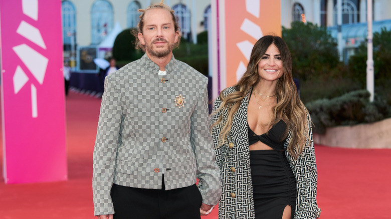 Brandt Andersen and Alison Victoria holding hands